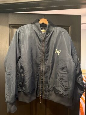 Air Force Women’s bomber jacket with AF Chest Logo.